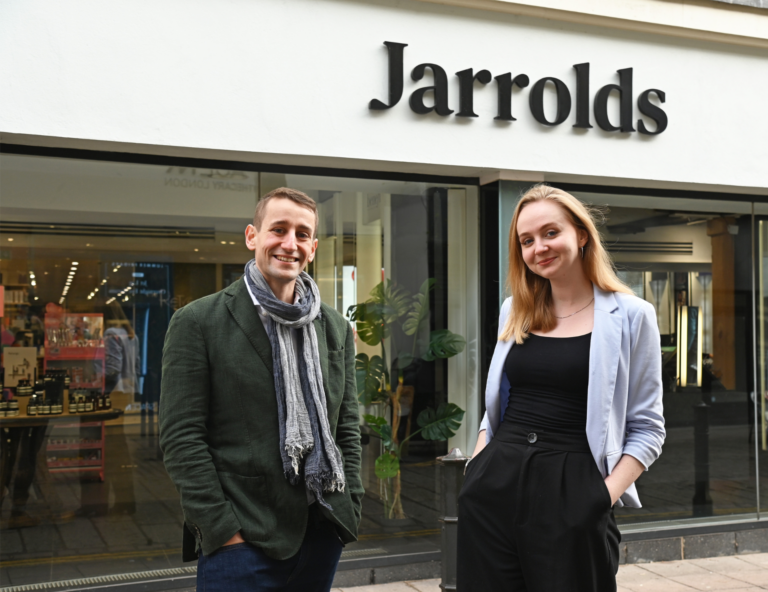 Sam Edwards and Grace Appleby in front of Jarrolds