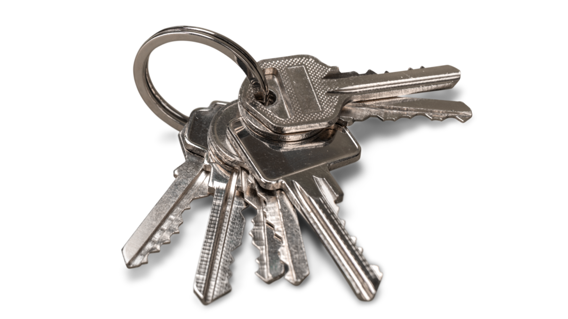 Six silver house keys connected with a keyring